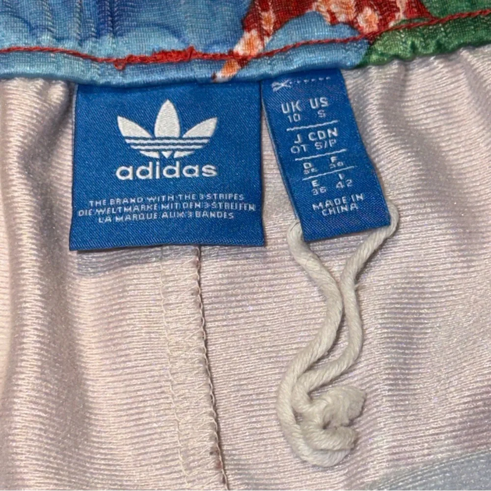 adidas Red Floral Athletic Shorts with Blue and Cream Flowers - Picture 7 of 7